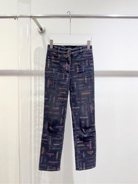 CHANEL Black Denim Jeans with Pink Logo Print